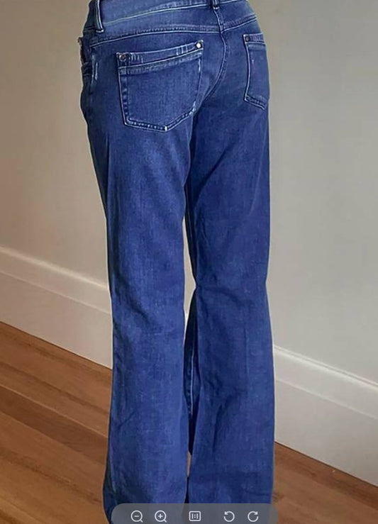 Pantalones vaqueros de mezclilla elásticos azul de pierna ancha con bolsillos