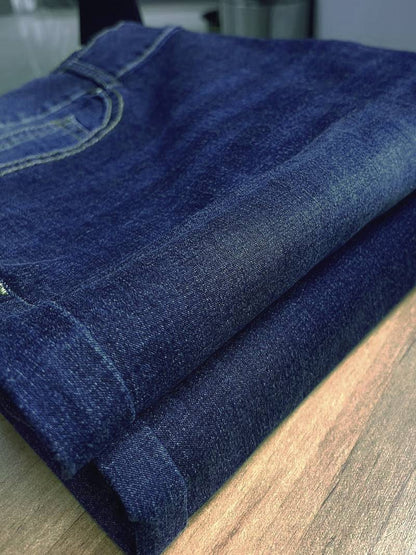 Pantalones vaqueros de mezclilla elásticos azul de pierna ancha con bolsillos